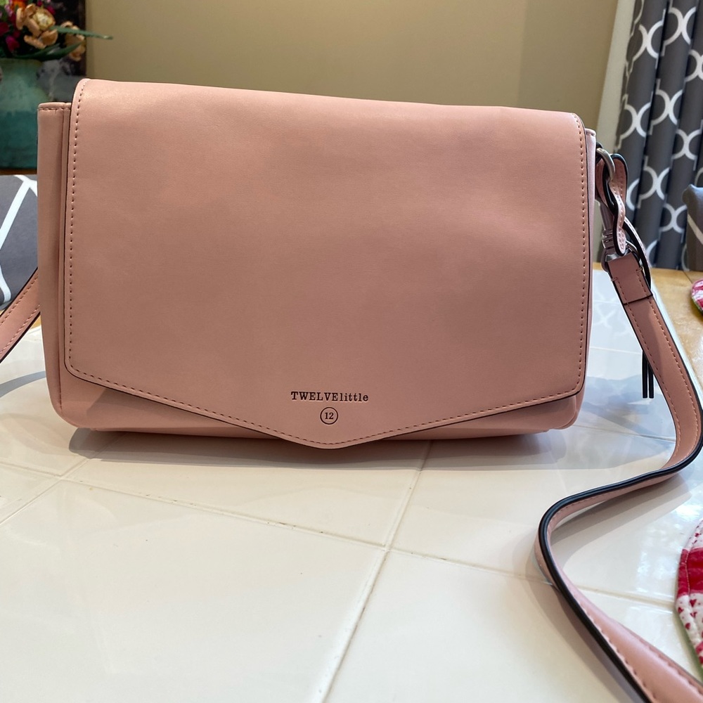 Twelve Little Pink Clutch 3 compartment clutch with wipe dispenser gently used